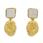 Gold earrings with pearl. Drop earring 